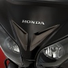 Kouřově-chromované lemy průduchů přední masky Honda GL...